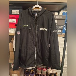 EARLY 2000s REEBOK OAKLAND RAIDERS ON FIELD COAT